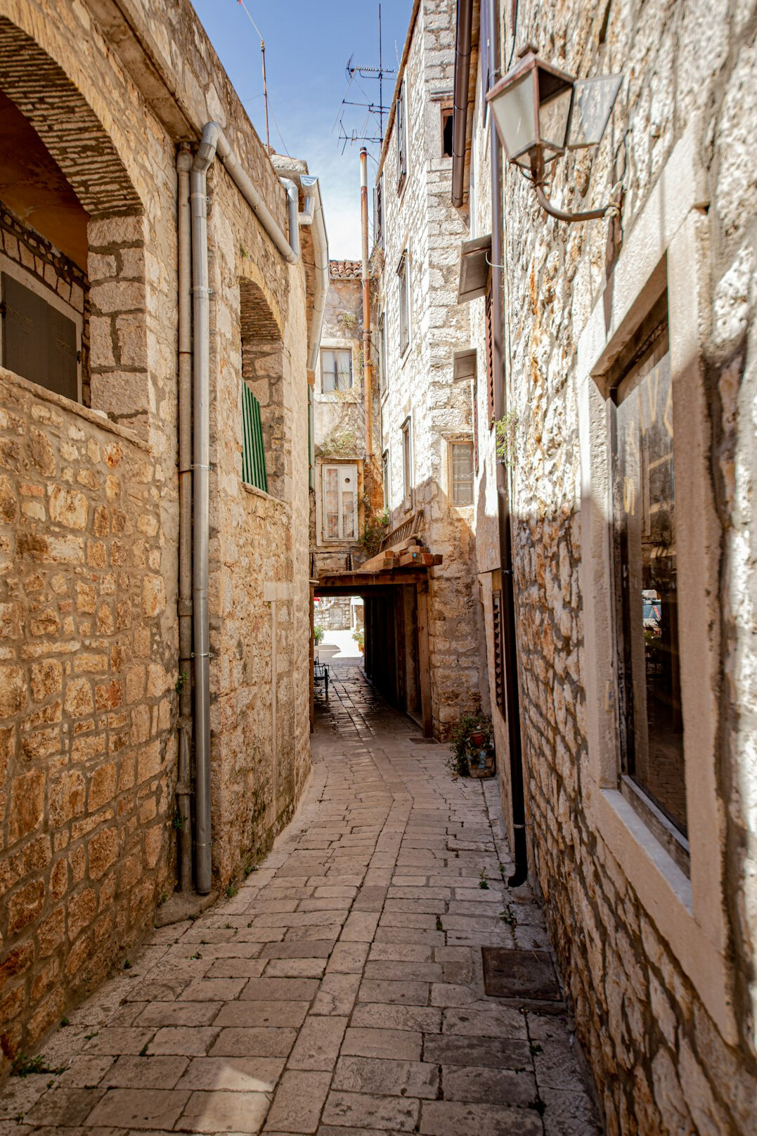 Old Adriatic coastal town alley at dusk